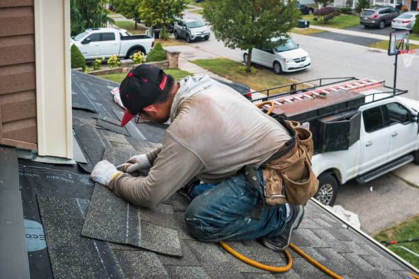 Professional Flat Roof Repair technician working in Fayetteville, NC
